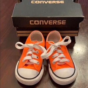 Used orange converse shoes